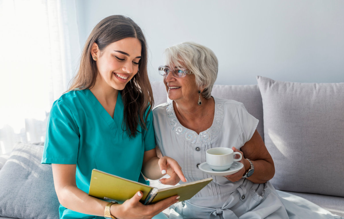 senior woman having a good time with caregiiver