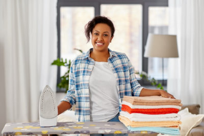 adult woman doing laundry work 